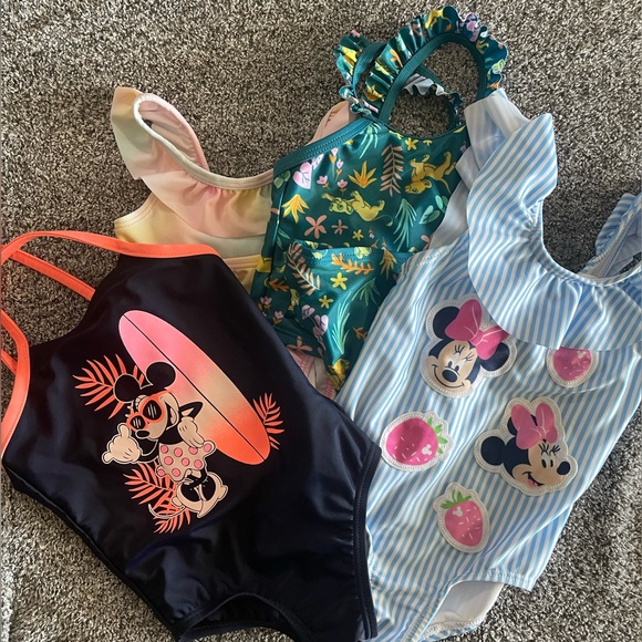 4 infant swim suits, 2 Minnie Mouse, 1 lion king and 1 multi colored - Picture 1 of 10